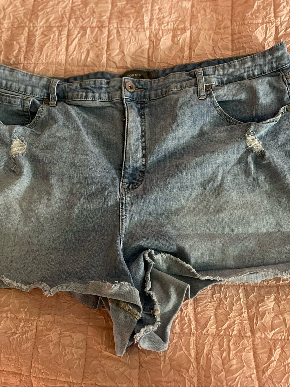 torrid faded blue distressed denim cutoff shorts